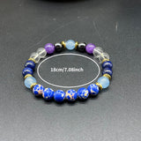 Handmade Natural Lapis Lazuli, Iron Ore, and Synthetic Crystal Bracelet – For Wealth, Courage, and Stress Relief