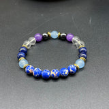 Handmade Natural Lapis Lazuli, Iron Ore, and Synthetic Crystal Bracelet – For Wealth, Courage, and Stress Relief